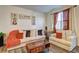 Inviting living room featuring hardwood floors, comfortable seating, and stylish decor at 534 Magnolia Cir, Palmetto, GA 30268