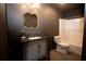 Bathroom featuring a vanity with gold fixtures and a shower/tub combo at 774 Forrester Cemetery Rd, Covington, GA 30014