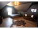 Bedroom featuring a bed, brown leather sofa and a faux animal hide rug at 774 Forrester Cemetery Rd, Covington, GA 30014