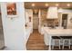 Bright kitchen features stainless appliances, and a brick backsplash with wood accents at 774 Forrester Cemetery Rd, Covington, GA 30014