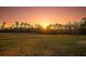 Rolling green landscape at sunset at 774 Forrester Cemetery Rd, Covington, GA 30014