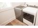 Laundry room with modern washer and dryer, offering convenience and efficiency at 774 Forrester Cemetery Rd, Covington, GA 30014