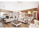 Spacious living area showcasing hardwood floors, stylish furniture, and a smooth flow to kitchen at 774 Forrester Cemetery Rd, Covington, GA 30014