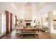Bright living room with a soaring fireplace and hardwood floors, creating an inviting space at 774 Forrester Cemetery Rd, Covington, GA 30014
