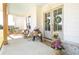 Charming front porch featuring a light blue ceiling, elegant décor, and rustic accents at 774 Forrester Cemetery Rd, Covington, GA 30014