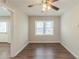 Cozy dining area featuring wood-look floors, ceiling fan, and neutral color palette at 1624 Linda Dr, Decatur, GA 30032