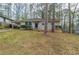 Charming single-story home with a manicured lawn and mature trees offering curb appeal at 1624 Linda Dr, Decatur, GA 30032