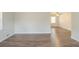 Light filled room featuring wood-look floors and a ceiling fan at 1624 Linda Dr, Decatur, GA 30032