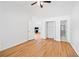 Bedroom with hardwood floors and access to ensuite bathroom and walk-in closet at 2365 Parkside Club Ln, Lawrenceville, GA 30044