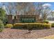 Parkside Village entrance sign with stone facade and manicured landscaping at 2365 Parkside Club Ln, Lawrenceville, GA 30044