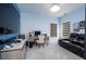 Bedroom set up as an office/media room with comfortable seating and lots of light at 25 Cherokee Hills Dr, Rydal, GA 30171