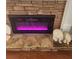 Modern electric fireplace insert with stone surround and display ledges at 25 Cherokee Hills Dr, Rydal, GA 30171