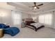 Cozy main bedroom showcasing a comfortable seating area and lots of natural light at 25 Cherokee Hills Dr, Rydal, GA 30171