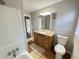 Bathroom featuring a granite vanity and a toilet at 3633 Mill Glen Dr, Douglasville, GA 30135