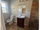 Traditional bathroom featuring a single sink vanity and tile flooring at 3633 Mill Glen Dr, Douglasville, GA 30135