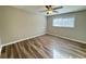 Bedroom with modern ceiling fan and hardwood floors at 3633 Mill Glen Dr, Douglasville, GA 30135
