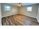 Bedroom featuring large windows and hardwood floors at 3633 Mill Glen Dr, Douglasville, GA 30135