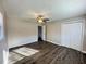 Spacious bedroom featuring hardwood floors, a ceiling fan, and closet at 3633 Mill Glen Dr, Douglasville, GA 30135