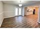 Dining room featuring wood floors, natural light, and neutral paint at 3633 Mill Glen Dr, Douglasville, GA 30135