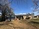 Charming two-story home features a combination of stone and siding exterior with a well-maintained front yard at 3633 Mill Glen Dr, Douglasville, GA 30135