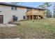 Spacious backyard featuring a wooden deck perfect for entertaining and a well-maintained lawn at 2000 Fairburn Sw Rd, Atlanta, GA 30331