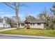Charming single-story home with wood porch and neutral paint color provides instant curb appeal at 2000 Fairburn Sw Rd, Atlanta, GA 30331