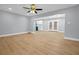 Bright and airy living room boasts hardwood floors and flows into the dining and kitchen areas at 2000 Fairburn Sw Rd, Atlanta, GA 30331