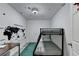 bedroom featuring a bunk bed and a creative map mural at 3071 Colonial Way # J, Atlanta, GA 30341