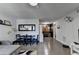 Open-concept living room with dining area and access to the bar area at 3071 Colonial Way # J, Atlanta, GA 30341