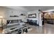 Stylish living room with sleek furnishings, dining area, and wood floors at 3071 Colonial Way # J, Atlanta, GA 30341