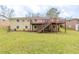 Expansive backyard with a well-maintained lawn and a multi-level deck perfect for enjoying the outdoors at 3202 Betty Cir, Decatur, GA 30032