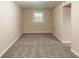 Finished basement area with carpet and window at 3202 Betty Cir, Decatur, GA 30032
