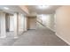 Spacious basement featuring neutral paint, carpet, and access to stairs at 3202 Betty Cir, Decatur, GA 30032