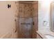 Bathroom shower features tile surround and handicap assist bars at 3202 Betty Cir, Decatur, GA 30032