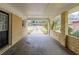 Spacious carport showing brickwork detail and view of the extended driveway at 3202 Betty Cir, Decatur, GA 30032