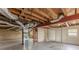 Unfinished basement featuring ductwork, a window, painted block walls, and potential for customization at 3465 Tulip Dr, Decatur, GA 30032