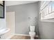 Standard bathroom with a neutral color scheme, tiled floor, and functional fixtures at 72 Polar Rock Rd, Atlanta, GA 30315