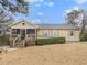 Charming single-story home featuring a screened front porch and well-maintained landscaping at 72 Polar Rock Rd, Atlanta, GA 30315
