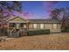 Charming single story home with a covered porch, small yard, and inviting curb appeal at 72 Polar Rock Rd, Atlanta, GA 30315