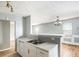 Well-lit kitchen featuring stainless steel sink, bright cabinets, and modern countertop at 72 Polar Rock Rd, Atlanta, GA 30315
