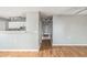 Bright and open living space with hardwood floors and a view into a modern kitchen at 72 Polar Rock Rd, Atlanta, GA 30315