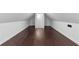 Spacious attic with finished hardwood flooring and ample natural light, perfect for storage at 7065 Walnut Mill Ct, Cumming, GA 30040