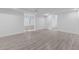 Open basement space with modern flooring and neutral walls, ready for customization at 7065 Walnut Mill Ct, Cumming, GA 30040