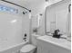 Bathroom featuring a shower-over-tub, and modern vanity for a functional and stylish design at 7065 Walnut Mill Ct, Cumming, GA 30040
