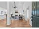 Inviting living room with hardwood floors, fireplace, and open floor plan, illuminated by natural light at 7065 Walnut Mill Ct, Cumming, GA 30040