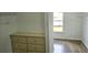 A spacious walk-in closet with shelving and drawer units at 838 Natchez Valley Ne Trce, Grayson, GA 30017