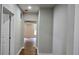Clean hallway with access to bedroom and other living spaces; featuring wood-look flooring at 838 Natchez Valley Trce, Grayson, GA 30017