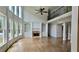 Spacious living area with soaring ceilings, fireplace, and large windows with an abundance of natural light at 838 Natchez Valley Trce, Grayson, GA 30017