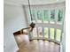 Open-concept living room with high ceilings and large windows offering bright, natural light at 838 Natchez Valley Trce, Grayson, GA 30017