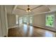 Main bedroom showcasing hardwood floors, trey ceiling, and natural light at 838 Natchez Valley Trce, Grayson, GA 30017